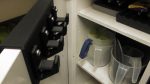 Kitchen cupboard door hanger