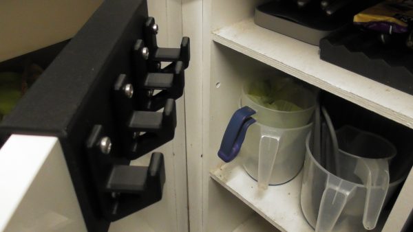 Kitchen cupboard door hanger
