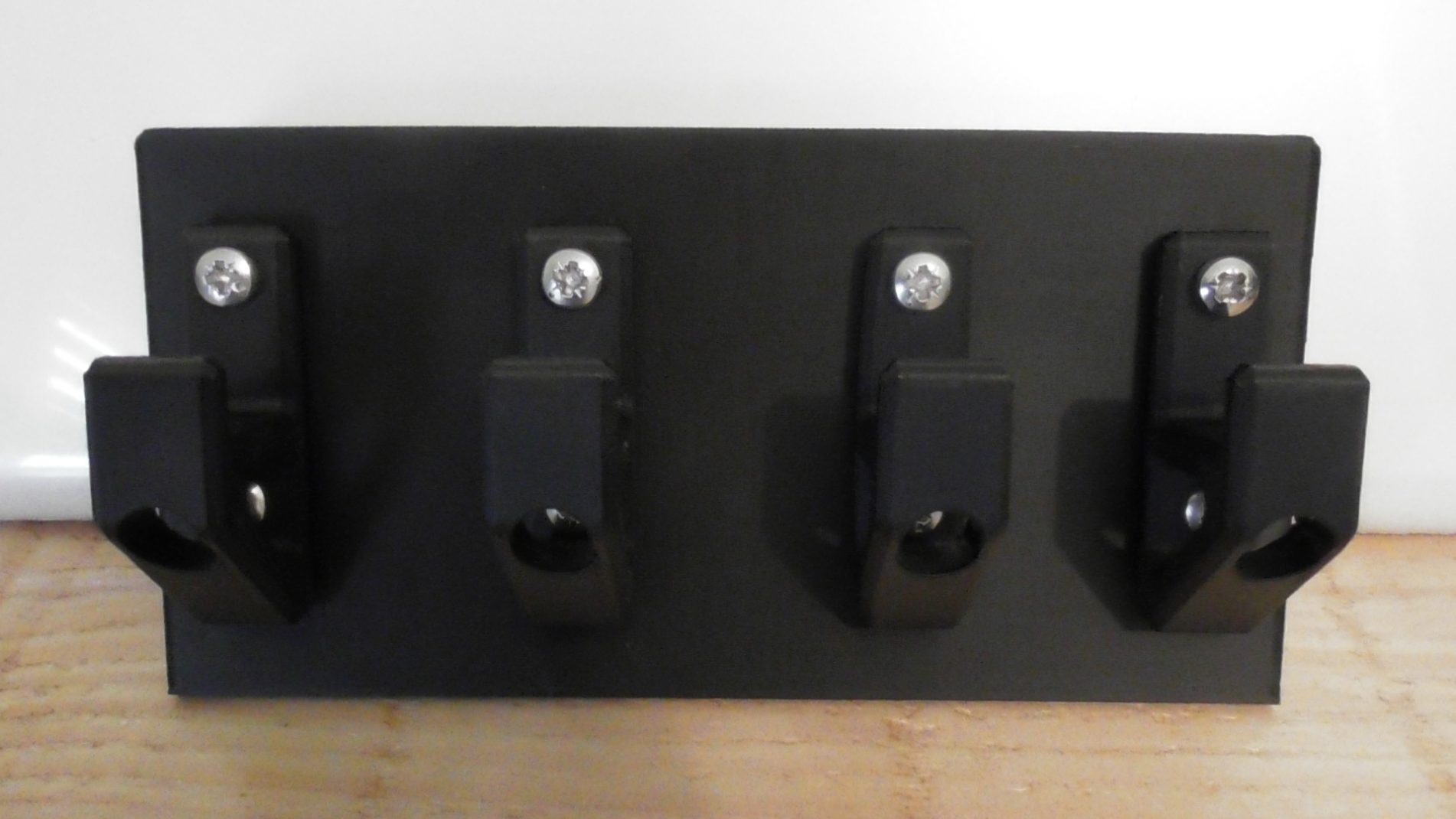 Kitchen cupboard door hanger